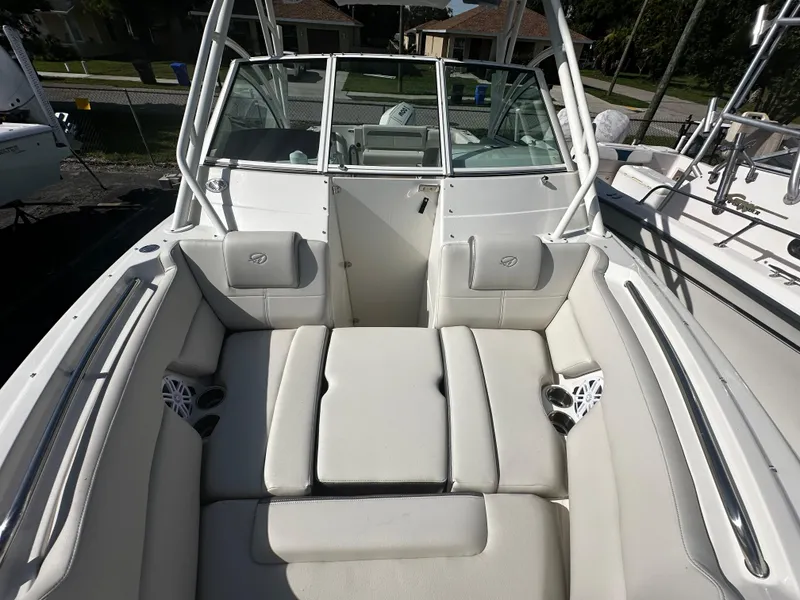 Slide: The Image of 2025 Sailfish 245 DC boat with spacious seating and modern design. - 27