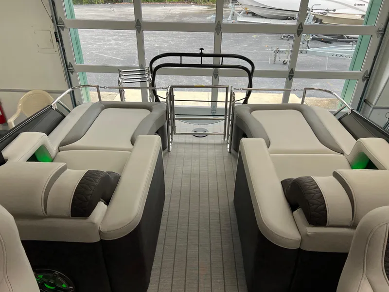 Slide: The Image of Interior of 2025 Godfrey Monaco 235 RL pontoon boat with luxurious seating. - 10