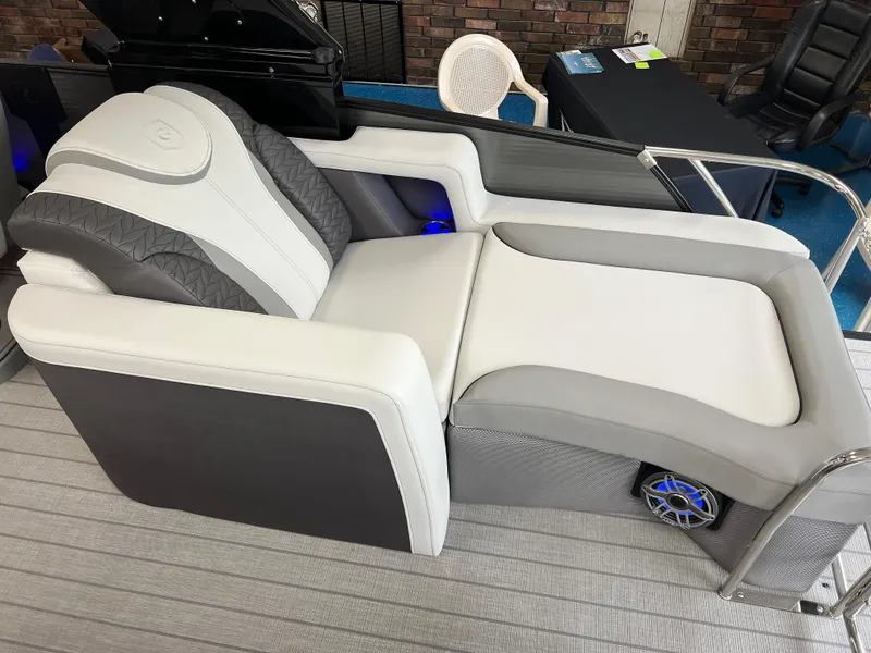 Slide: The Image of Luxurious seating on the 2025 Godfrey Monaco 235 RL pontoon boat. - 11