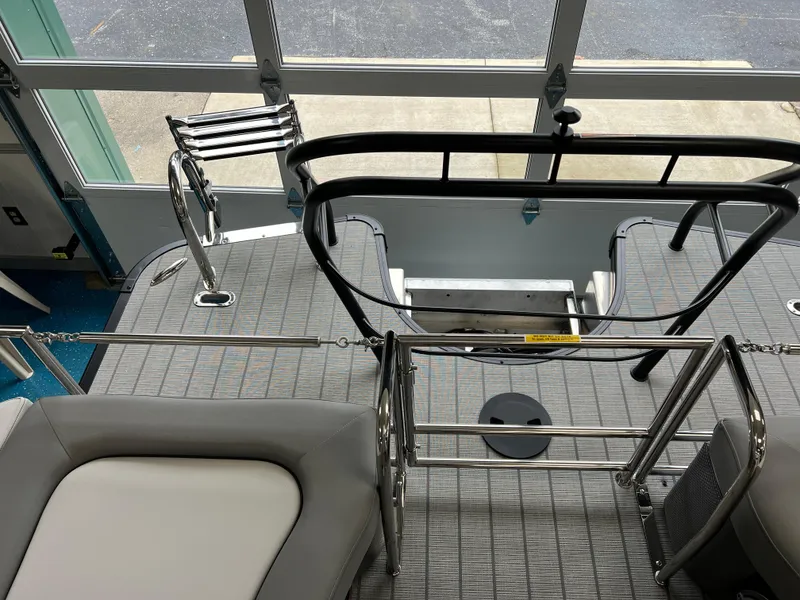 Slide: The Image of 2025 Godfrey Monaco 235 RL boat interior, rear seating and deck view. - 12