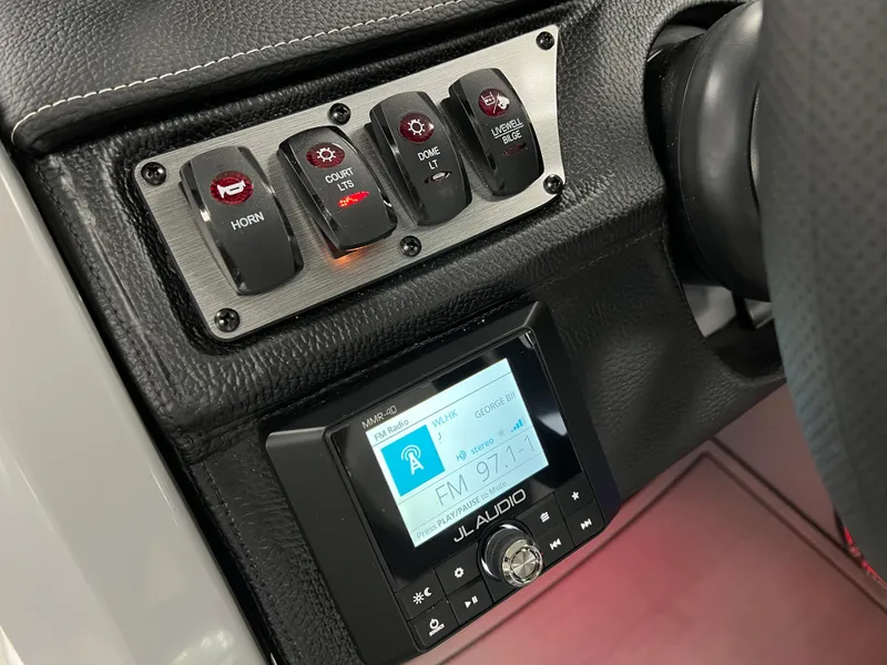 Slide: The Image of Control panel and audio system of 2025 Godfrey Monaco 235 RL boat. - 20
