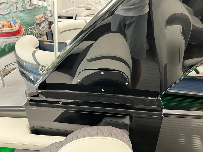 Slide: The Image of 2025 Godfrey Monaco 235 RL interior with modern seating and sleek design. - 24