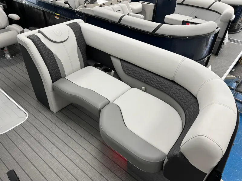 Slide: The Image of 2025 Godfrey Monaco 235 RL boat interior with luxurious seating. - 6