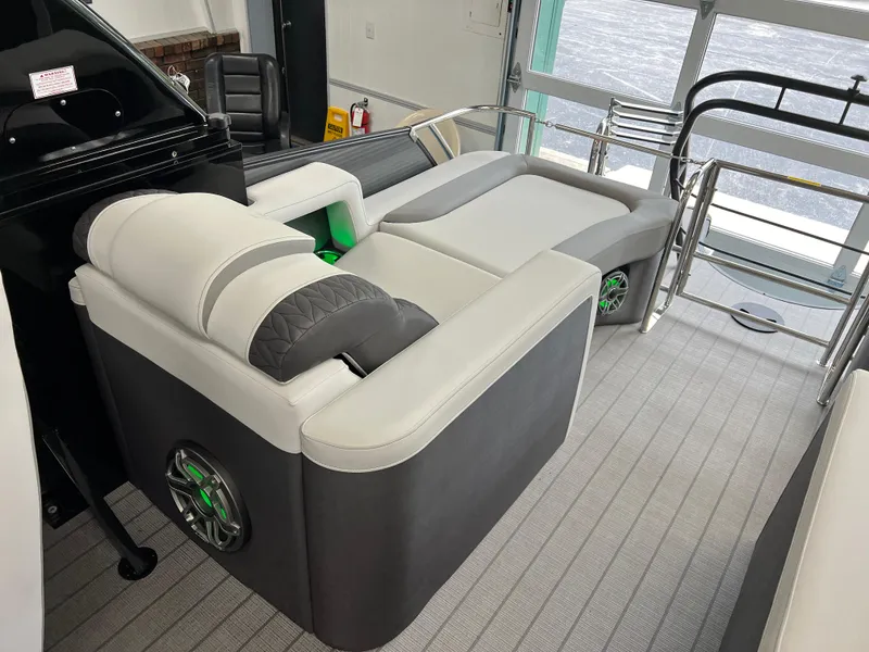 Slide: The Image of 2025 Godfrey Monaco 235 RL boat interior with luxurious seating and modern design. - 9