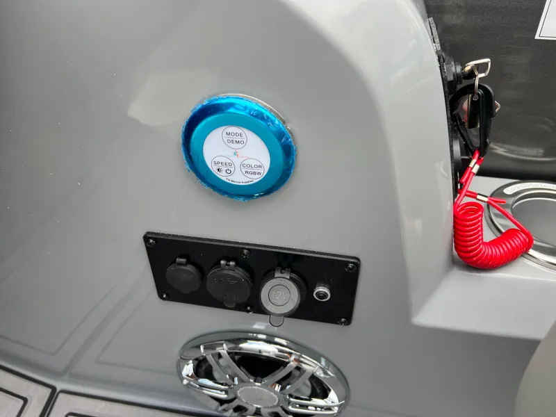 Slide: The Image of Control panel of 2025 Godfrey Monaco 235 RL boat with various switches and connectors. - 22