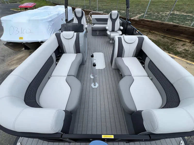 Slide: The Image of 2025 Godfrey Monaco 235 RL pontoon boat with luxurious seating and modern design. - 7