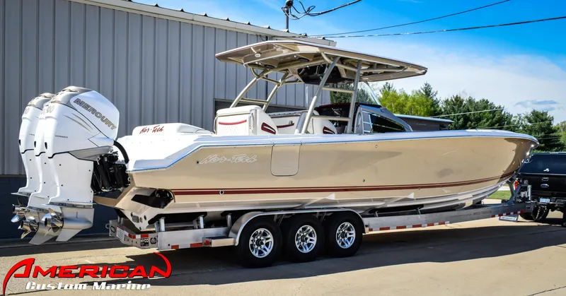 The Image of 2015 Nor-Tech 390 Center Console boat on a trailer at American Custom Marine. - 1