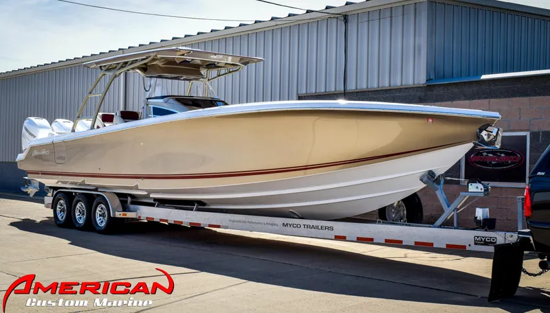 Slide: The Image of 2015 Nor-Tech 390 Center Console boat on a trailer at American Custom Marine. - 3