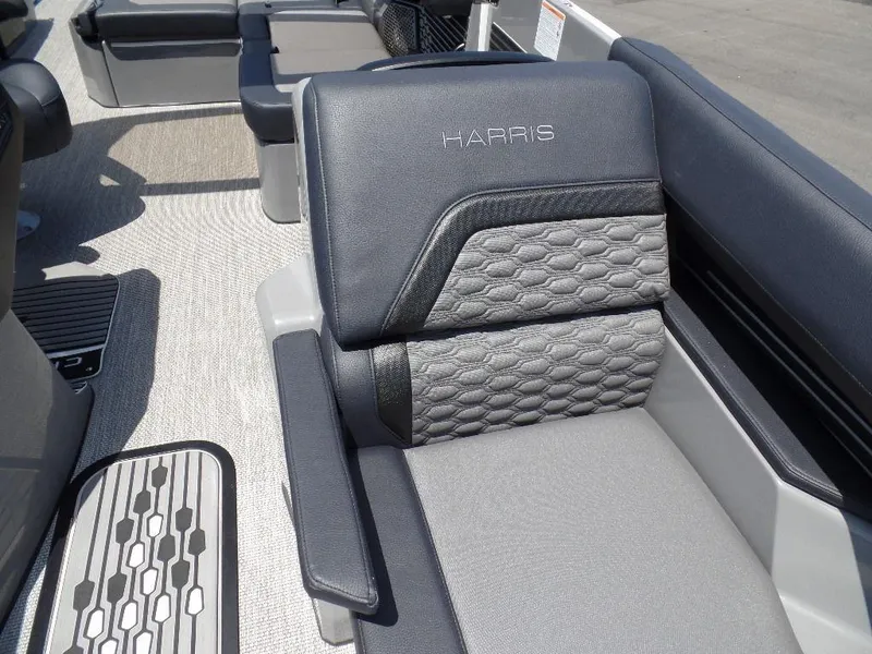 Slide: The Image of Luxurious seating on 2025 Harris Crowne 250 boat with modern design and textured upholstery. - 10