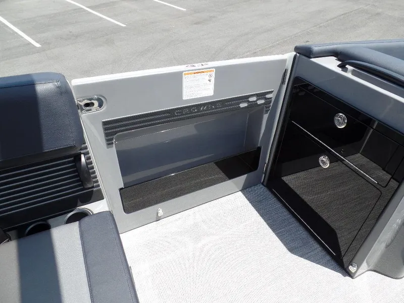 Slide: The Image of 2025 Harris Crowne 250 boat interior with seating and storage compartments. - 18