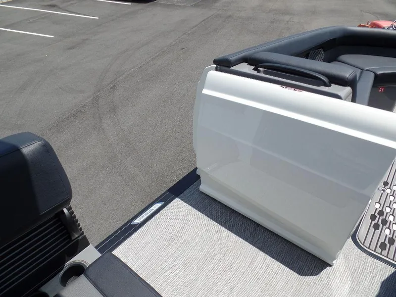 Slide: The Image of 2025 Harris Crowne 250 boat interior with seating and flooring details. - 19