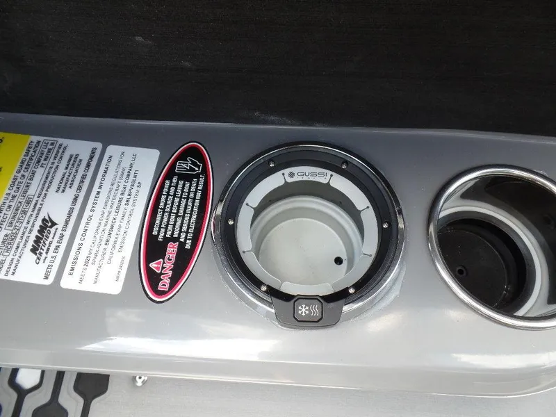 Slide: The Image of Fuel cap and warning labels on 2025 Harris Crowne 250 boat. - 27