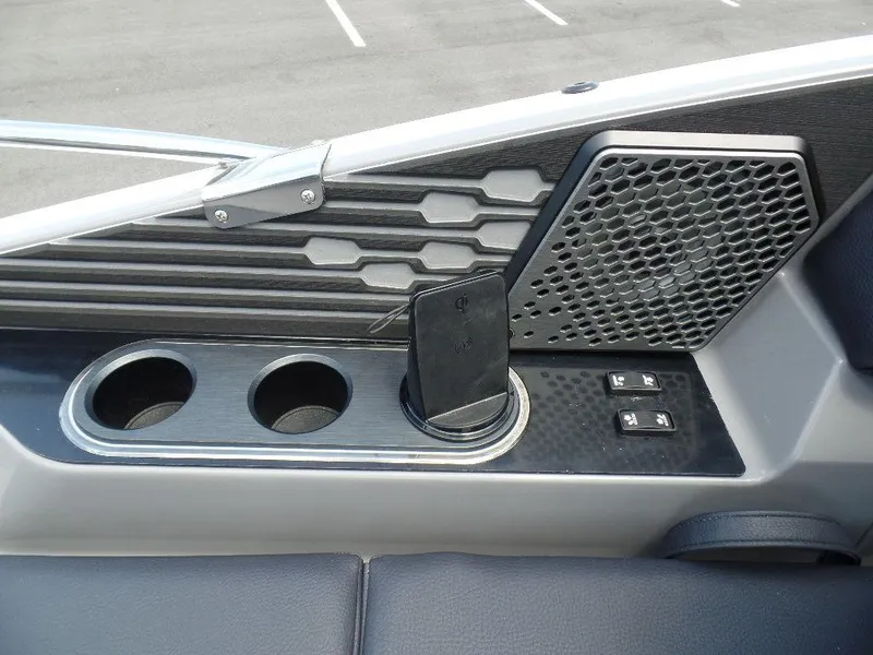 Slide: The Image of Interior of 2025 Harris Crowne 250 boat with cup holders and phone dock. - 28