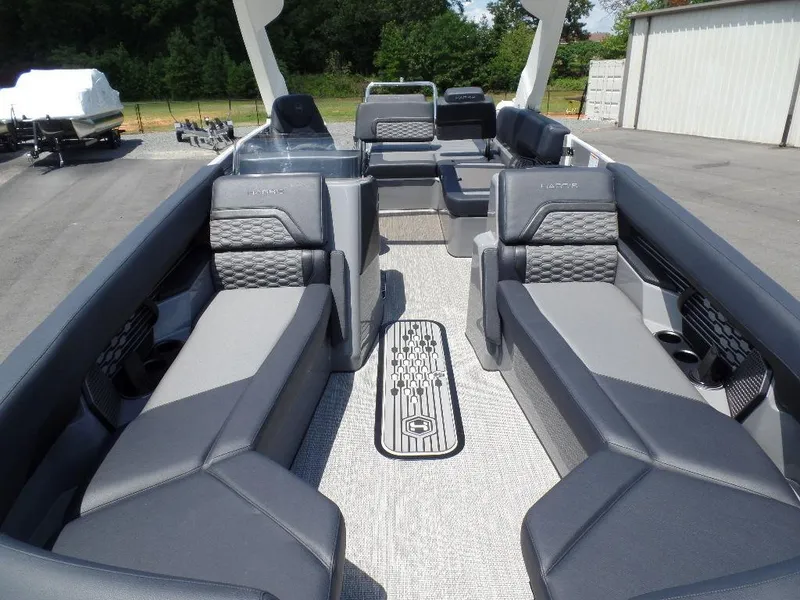 Slide: The Image of 2025 Harris Crowne 250 boat interior with luxurious seating and modern design. - 4