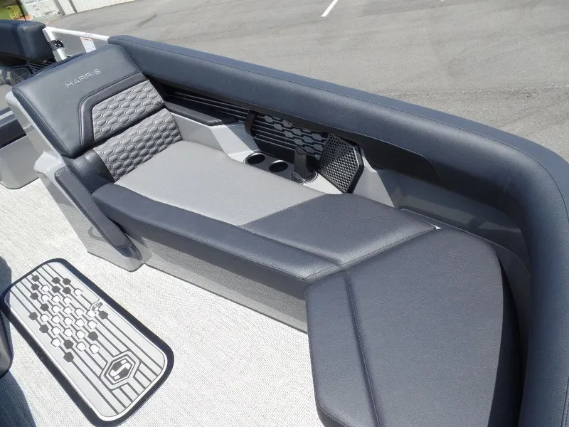Slide: The Image of 2025 Harris Crowne 250 boat interior with sleek seating and modern design. - 6