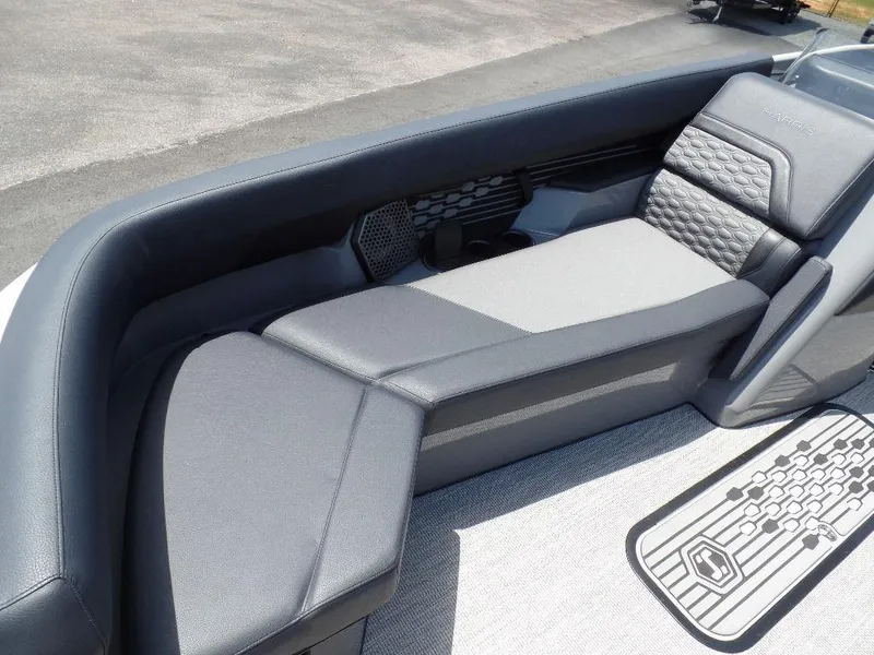Slide: The Image of 2025 Harris Crowne 250 boat interior with sleek gray seating and modern design. - 7
