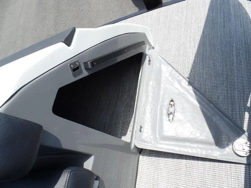 Slide: The Image of Open storage compartment on 2025 Harris Crowne 250 boat. - 8