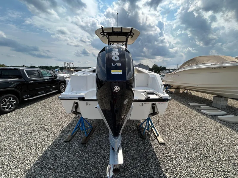 Slide: The Image of 2024 Boston Whaler 230 Outrage boat with Mercury engine on display. - 4