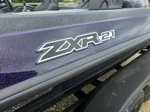Slide: The Image of Close-up of 2025 Skeeter ZXR21 boat model logo. - 18