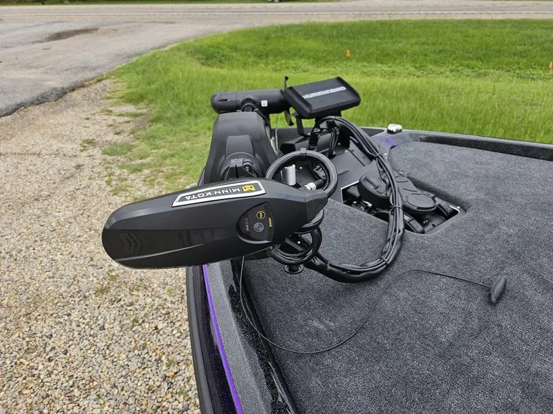 Slide: The Image of 2025 Skeeter ZXR21 boat with Minn Kota trolling motor on deck. - 4