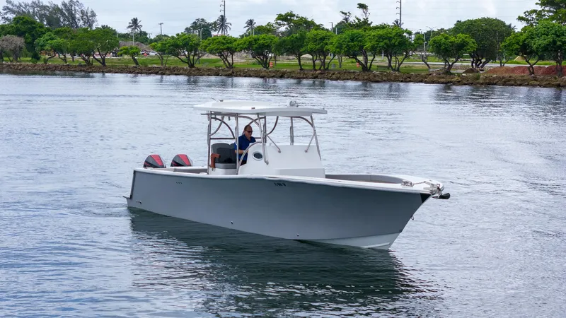 Slide: The Image of 2023 Seahorse 36 CC boat cruising on a calm river. - 7