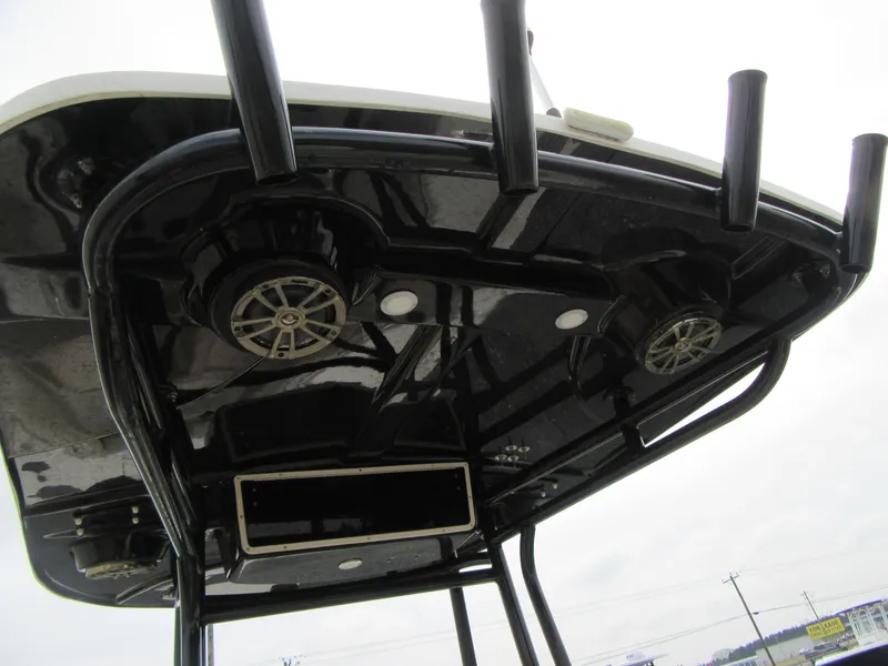 Slide: The Image of 2016 Carolina Skiff Sea Chaser 22 HFC T-top with rod holders and speakers. - 10