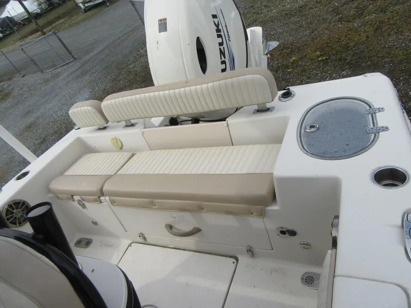 Slide: The Image of 2016 Carolina Skiff Sea Chaser 22 HFC boat interior with Suzuki outboard motor. - 14