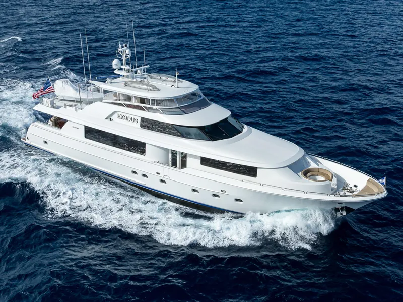 Slide: The Image of Luxurious 2008 Westport 112 yacht cruising on open sea. - 1