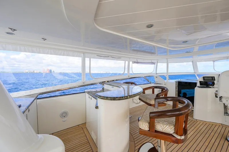 Slide: The Image of Luxurious interior of 2008 Westport 112 yacht with ocean view and elegant seating. - 14