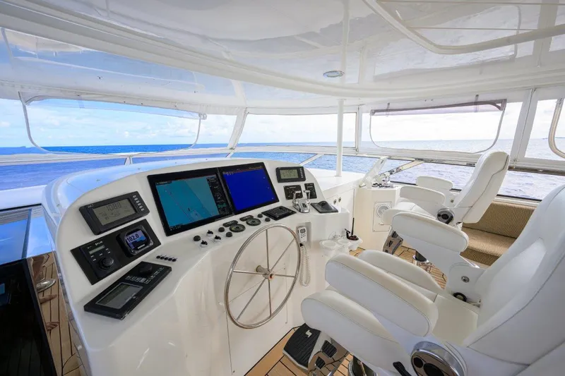 Slide: The Image of Luxurious helm of 2008 Westport 112 yacht with ocean view and advanced navigation systems. - 18