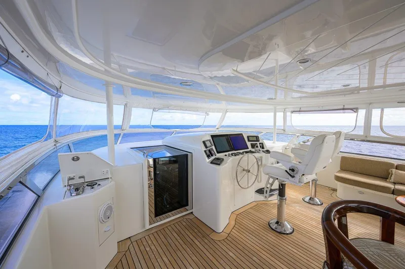 Slide: The Image of Luxurious 2008 Westport 112 yacht helm with ocean view and modern controls. - 19