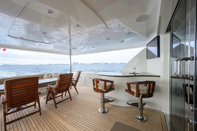 Slide: The Image of Luxurious 2008 Westport 112 yacht deck with seating and ocean view. - 23