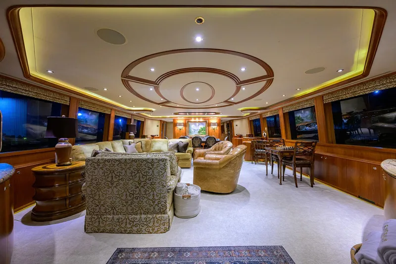 Slide: The Image of Luxurious interior of a 2008 Westport 112 yacht with elegant seating and ambient lighting. - 28
