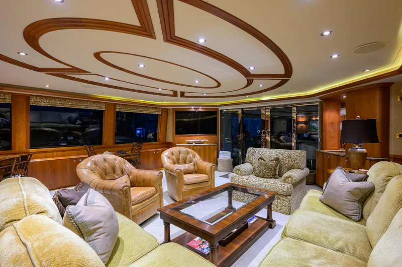 Slide: The Image of Luxurious interior of 2008 Westport 112 yacht with elegant seating and wooden accents. - 29