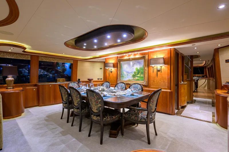 Slide: The Image of Luxurious dining area on 2008 Westport 112 yacht, featuring elegant decor and ambient lighting. - 32