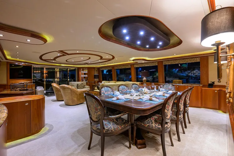 Slide: The Image of Luxurious interior of 2008 Westport 112 yacht with elegant dining area and plush seating. - 34