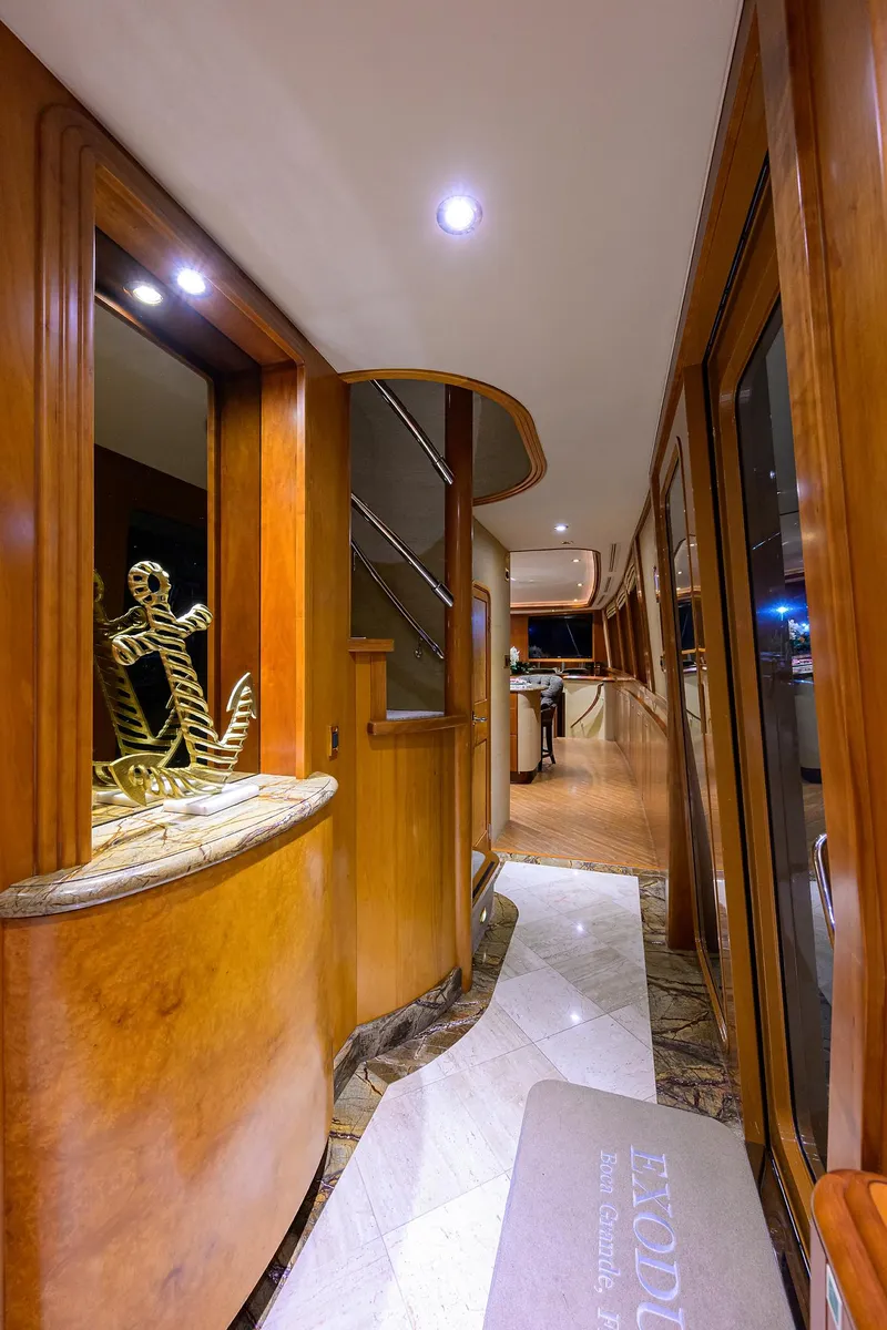 Slide: The Image of Luxurious interior hallway of 2008 Westport 112 yacht with elegant wood finishes. - 35