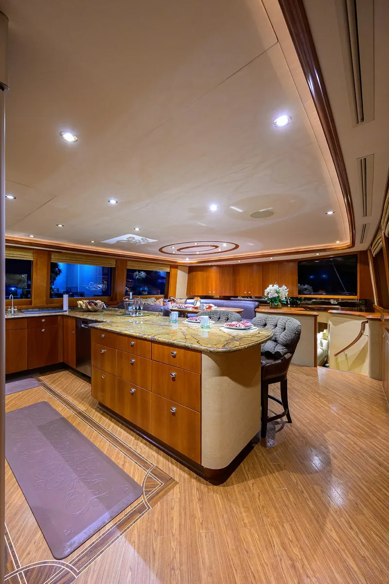 Slide: The Image of Luxurious interior of 2008 Westport 112 yacht with elegant wood finishes and modern lighting. - 37