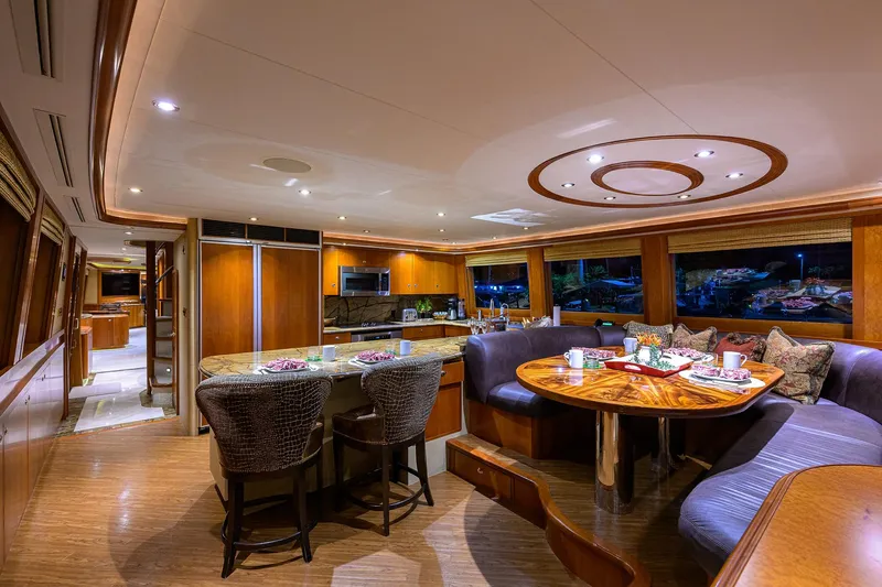 Slide: The Image of Luxurious interior of 2008 Westport 112 yacht with elegant dining and kitchen area. - 40