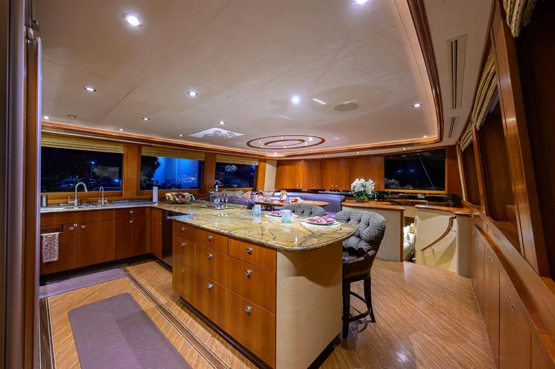 Slide: The Image of Luxurious kitchen interior on 2008 Westport 112 yacht with elegant wood finishes and modern amenities. - 42