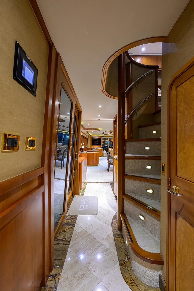 Slide: The Image of Luxurious interior of 2008 Westport 112 yacht with elegant staircase and modern design. - 48