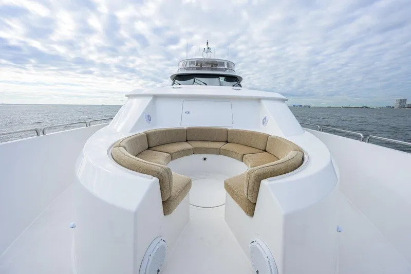 Slide: The Image of Luxurious 2008 Westport 112 yacht with spacious outdoor seating area. - 5
