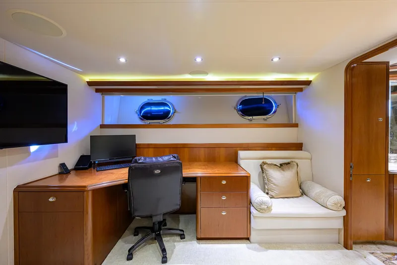 Slide: The Image of Luxurious office space on 2008 Westport 112 yacht with desk, chair, and seating area. - 56