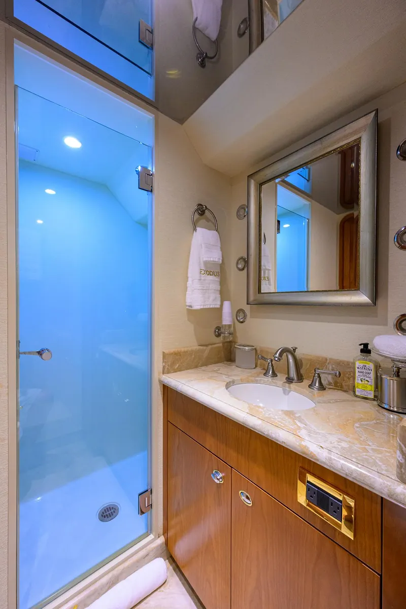 Slide: The Image of Luxurious bathroom on 2008 Westport 112 yacht with glass shower and elegant fixtures. - 59
