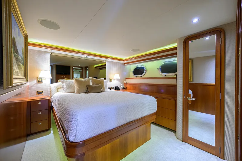 Slide: The Image of Luxurious bedroom interior of 2008 Westport 112 yacht with elegant wood finishes. - 60