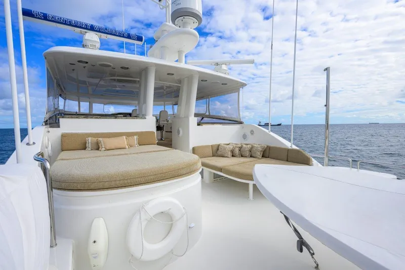 Slide: The Image of Luxurious 2008 Westport 112 yacht deck with plush seating and ocean view. - 8