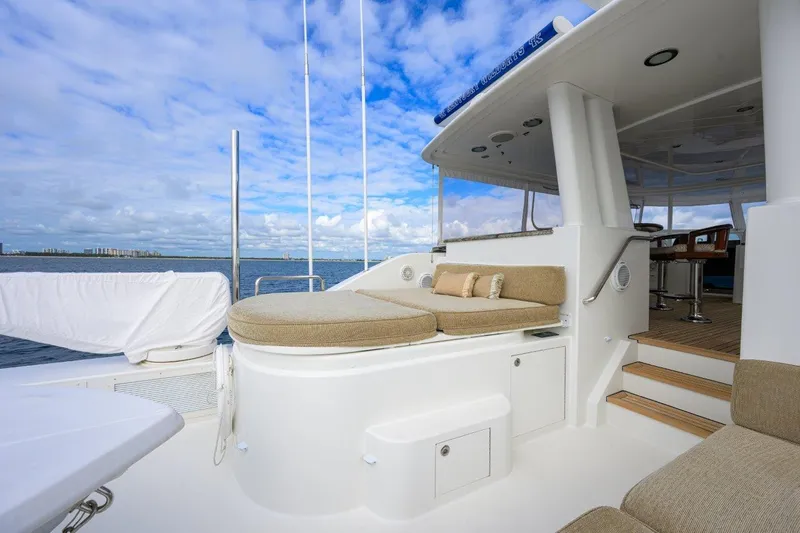 Slide: The Image of Luxurious 2008 Westport 112 yacht deck with comfortable seating and ocean view. - 9