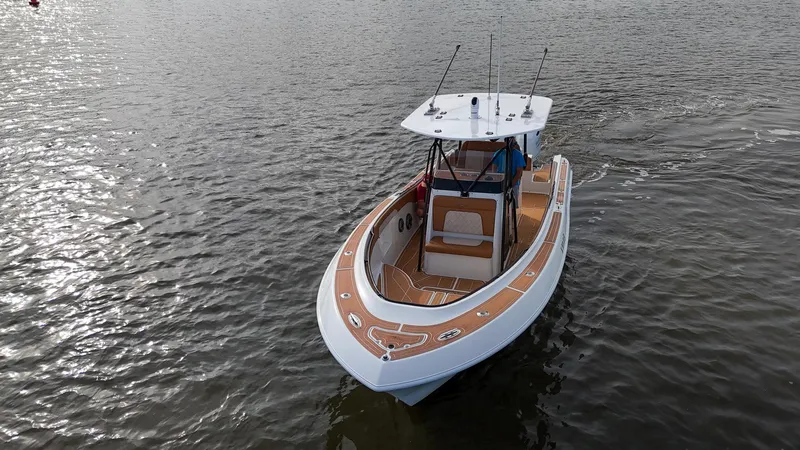 Slide: The Image of 2000 Hydra-Sports 2796 Vector boat on calm water. - 1