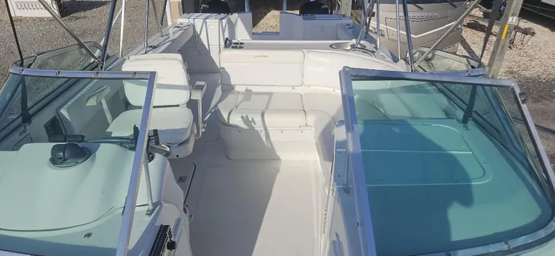 Slide: The Image of 2007 Glacier Bay 2640 Renegade boat interior with seating and open deck. - 7