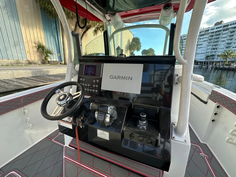 Slide: The Image of 2020 Wellcraft 302 Fisherman boat console with Garmin navigation system. - 14